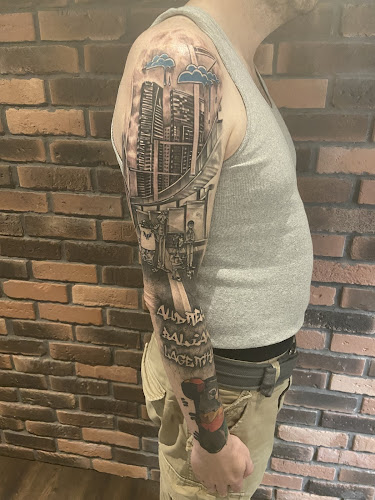 Negocio Mittenza Ink - Electric Tattooing